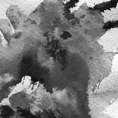 A watercolor background with black splashes