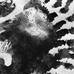 A watercolor background with black splashes