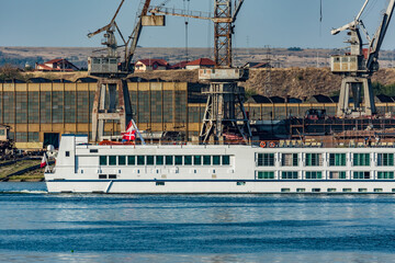 Kladovo, Serbia and across river Danube is Drobeta-Turnu Severin, Romania, Europe. Afternoon impressions from water border place