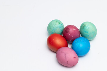 Homemade colored Easter eggs  on the white background  ready  for Easter