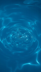 Long background with a swirl of blue clear water, close-up. with white shades