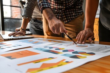 Team Collaborates on Data Analysis Charts, Reviewing Financial Reports and Business Strategies for Growth and Success.  Innovative Solutions and Creative Problem Solving in a Modern Workplace Setting.