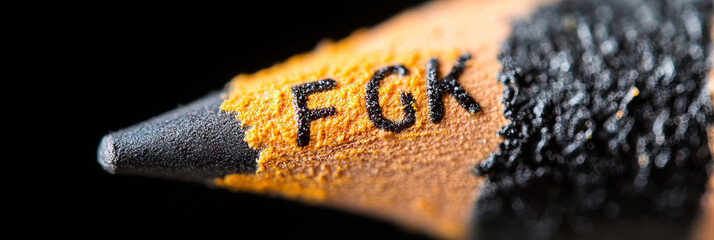 Close-up of Colored Pencil with "FGK" Marking