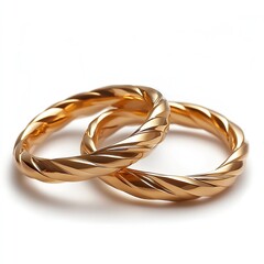 Two elegant gold wedding rings isolated on a white background, symbolizing love, commitment, and marriage. isolated white background, transparent .