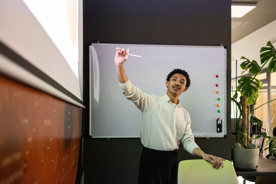 Professional presentation in modern office setting with projector