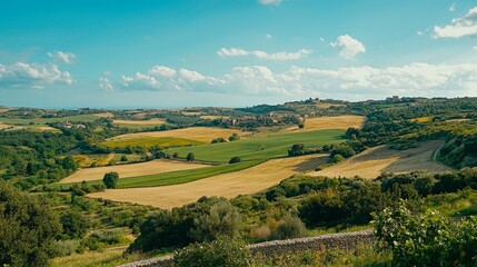 Scenic Rolling Hills and Lush Green Valleys Under Blue Sky