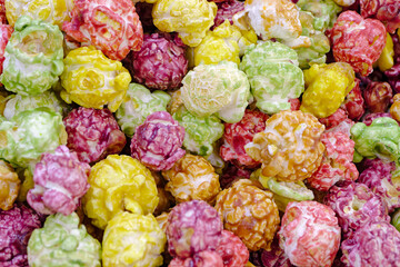 Lots of colorful caramelized sweet popcorn