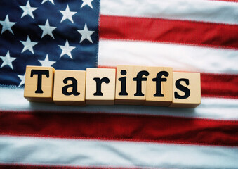 Import Trade Tariffs increase concept with United States of America Flag. Trade wars 
