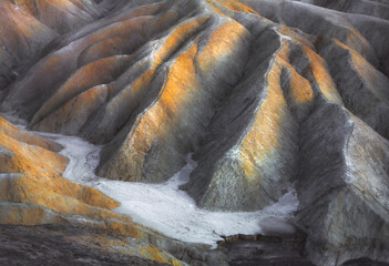 Geologic erosions of Zabriskie Point are timeless.  Silhouetted ridges are the result of ancient...