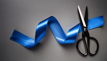 grand opening illustrated with scissors and a blue ribbon on a gray background