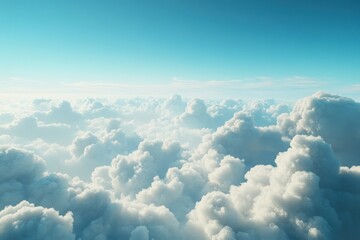 Vast clouds under a clear blue sky at midday