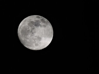 full moon over black