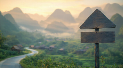 Sleek Wooden Arrow Signpost in Focus with Ha Giang's Towering Karst Mountains, Lush Green Valleys, Traditional Stilt Houses, and Soft Morning Mist in Northern Vietnam