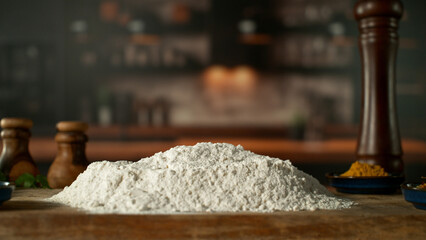 Closeup of flour on wooden desk in kitchen . Closeup of Meat Preparation
