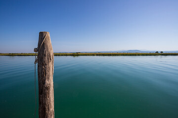 Obraz premium molo alla foce del fiume Isonzo