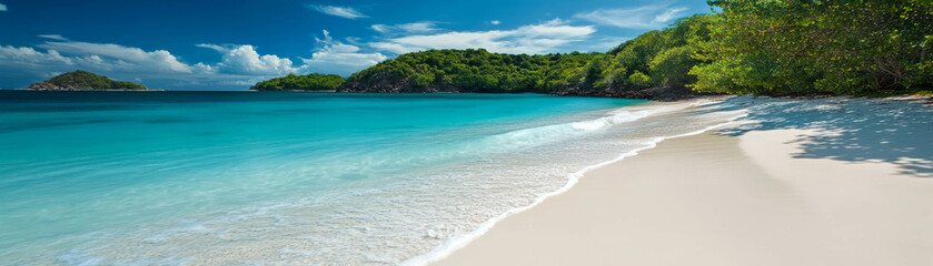 Relaxing white sand beach with turquoise water and gentle waves under a bright sky