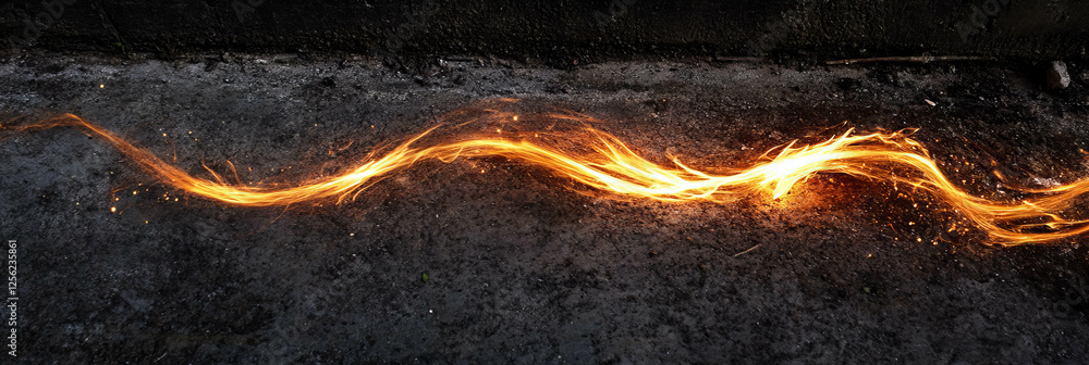 Poster fire streaks on ground create dynamic patterns and textures in low light environment