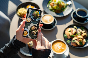 Snapping a Picture Before Enjoying a Meal. Food Photography Moment at a Cozy Coffee Shop. Brunch Aesthetic: Pancakes, Lattes, and a Perfect Morning