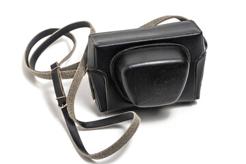 Black leather case for retro camera, highlighted on white background.