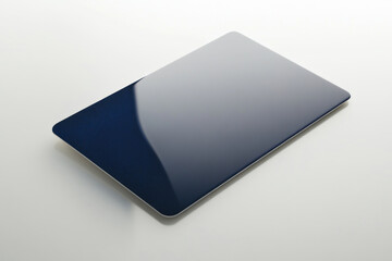 Sleek modern credit card positioned at an angle against a minimalist background, ideal for showcasing payment solutions or financial themes