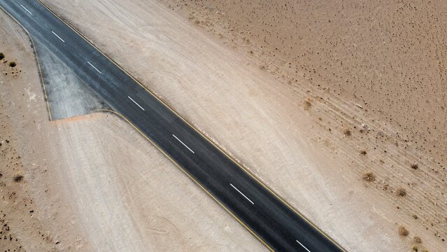 empty tar road in desert