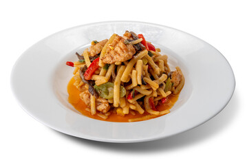 Bami Goreng Indonesian dish Noodle with chicken, mushrooms and vegetables in white plate isolated
