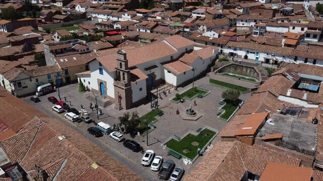 Church of san blas in cusco peru surrounded by buildings and tourists
