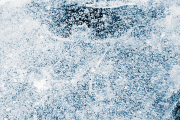 Ice texture background. The textured rough crushed cold frosty surface of the ice block background.