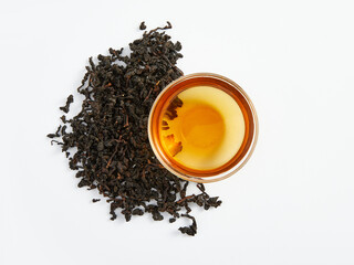 Chinese tea in a transparent tea ceremony cup on a white background