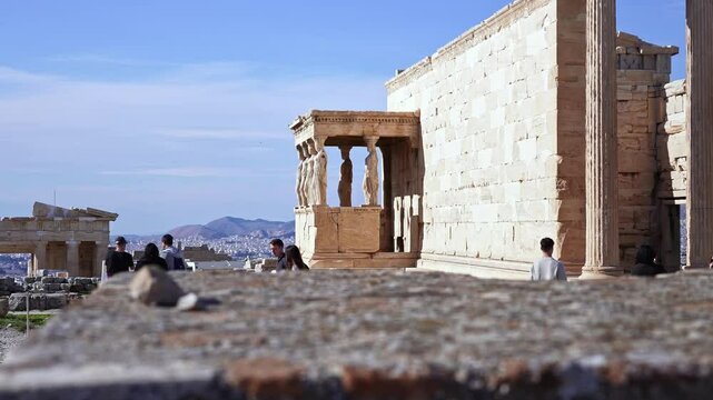 Temple of Athena Nike with columns on Acropolis hill. Ancient temple, historic landmark. Popular travel destination in Europe.