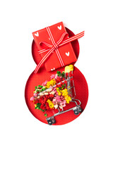 Obraz premium A red mini shopping cart filled with colorful flowers and a gift box inside a red number eight cutout. Ideal for Women's Day celebrations.