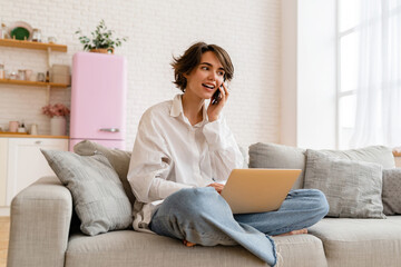Fototapeta premium young pretty woman working online freelancer, remote job