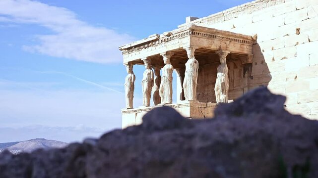 Temple of Athena Nike with columns on Acropolis hill. Ancient temple, historic landmark. Popular travel destination in Europe.
