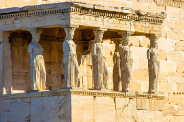 Caryatid women pillars on the Erechtheion in Athens, Greece.