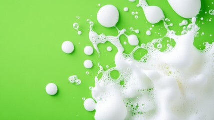 White Foam on Green Background - Abstract of white foam bubbles on a bright green background. Perfect for cleaning product, cosmetic, or spa advertising