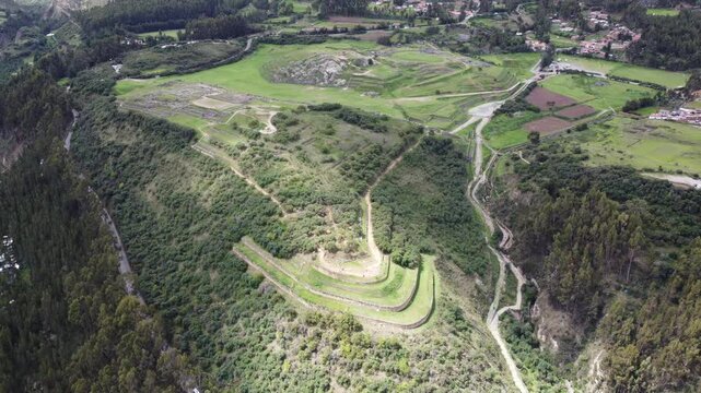 Majestic aerial views of sacsayhuaman, showcasing inca stonework and agricultural terraces near