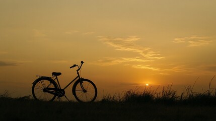 Obraz premium Silhouette Bicycle at Sunset Landscape