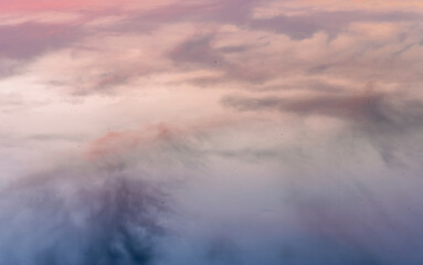beautiful nature background of lake water surface with nice sky cloud reflection