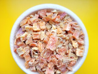 Chopped and dried pieces of delicious carrot.