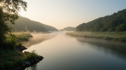 Serene River Landscape at Dawn with Mist and Lush Green Hills