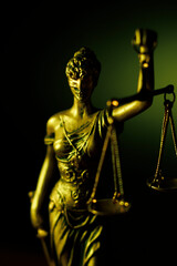 Obraz premium Lady Justice with green light background