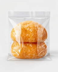 Soft, golden baked buns packed in a clear plastic pouch for freshness and convenience