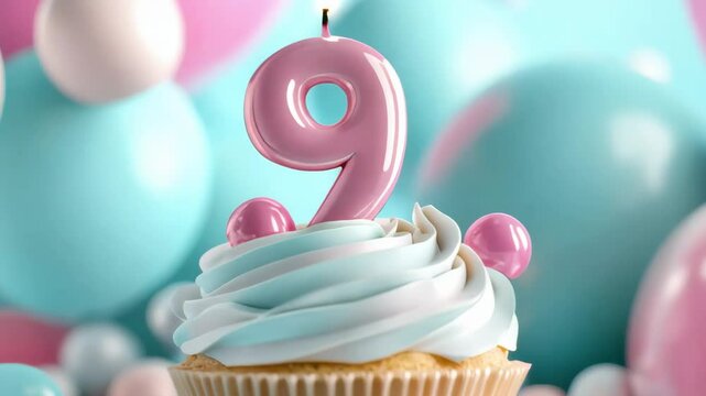 Birthday cupcake with burning candle number 9 nine and festive bokeh lights on creative pastel background. Nine years, nine month milestone celebration card