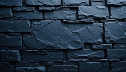 Dark blue slate rock texture background with rough, cracked layers of stone, creating a natural, rugged surface. Ideal for nature, geology, or abstract design projects.