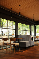 Stylish cafe with large windows. Interior design