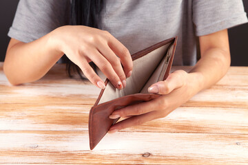 woman hand open empty wallet