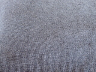 brown fabric with dense texture and soft surface, material for upholstery of sofas, armchairs and pillows, close-up full frame