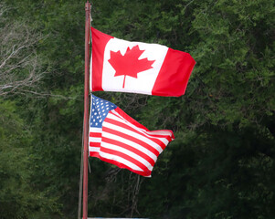 Canadian And American Flags Flying Proudly At The Saskatchewan International Raceway, Saskatoon...
