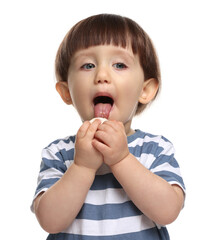 Cute little child eating tasty mochi on white background