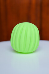 hand holding sensory textured ball babies toddlers tactile stimulation sensory play early childhood...